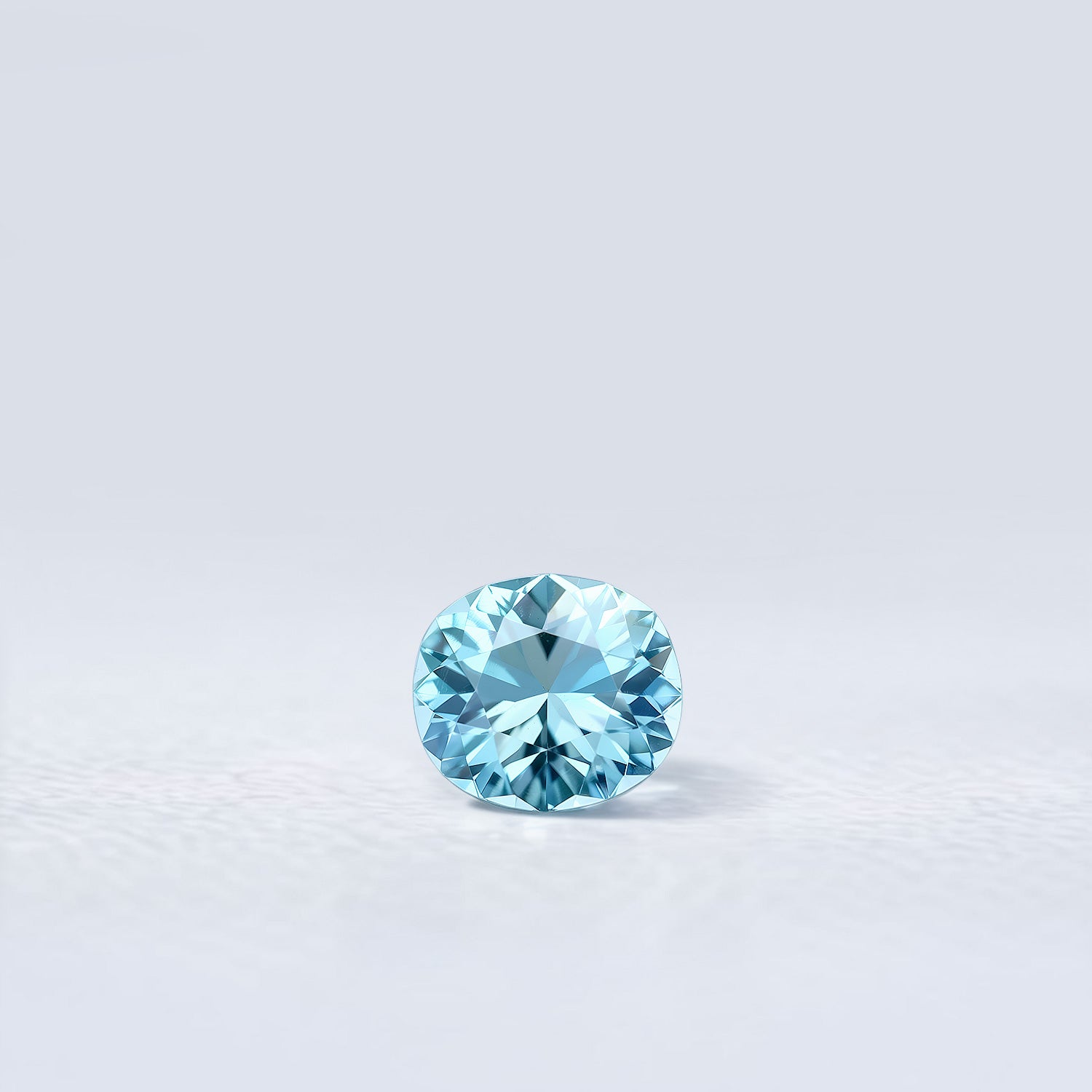 Aigue-marine 1,39 ct de Madagascar, ovale facettée, cyan bleuté léger, dimensions 8,1×7,2×4,6mm