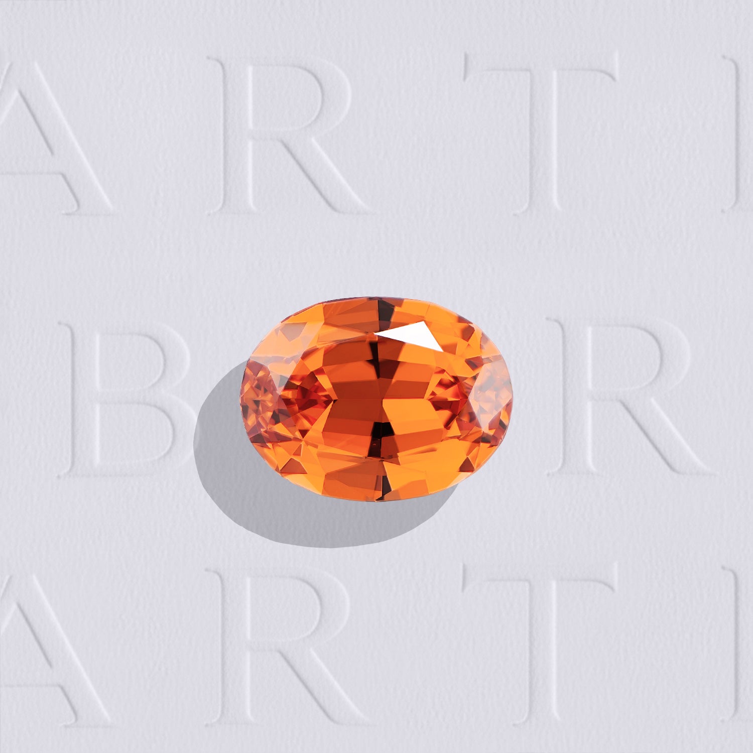 Grenat spessartite naturel ovale facetté de 1.34 carat, originaire du Nigéria, de couleur orange soutenu et très légèrement inclus.