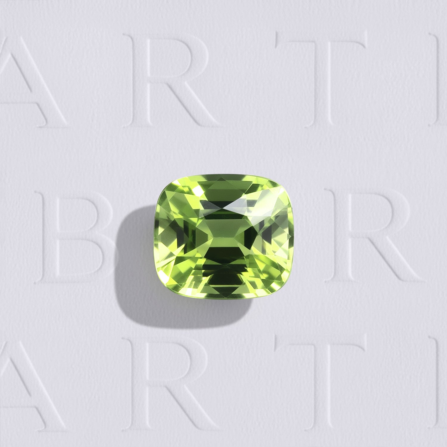 Péridot naturel coussin rectangle 1.49 carat, facetté, couleur vert jaune prononcé, provenance Myanmar