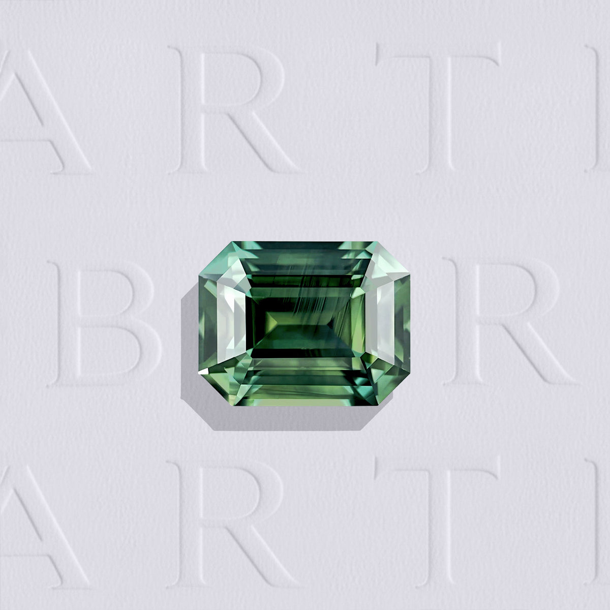 Saphir bicolore naturel rectangle à pans coupés facetté de 1.17 carat, originaire d’Australie, bleu-vert et vert-jaune, légèrement inclus. Aucun traitement.