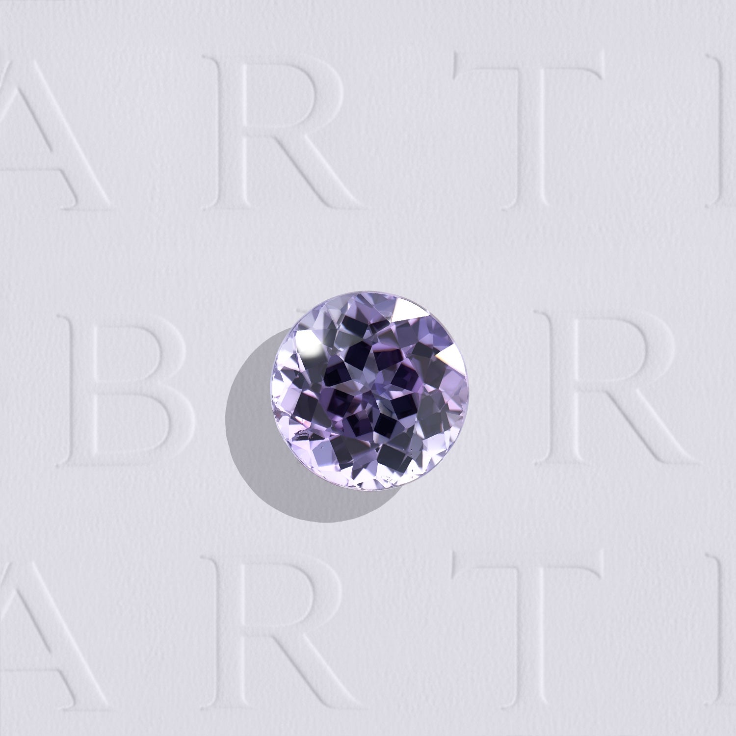 Saphir naturel bicolore non chauffé rond de 1.60 carat, facetté, de teinte bicolore soutenue, originaire de Madagascar