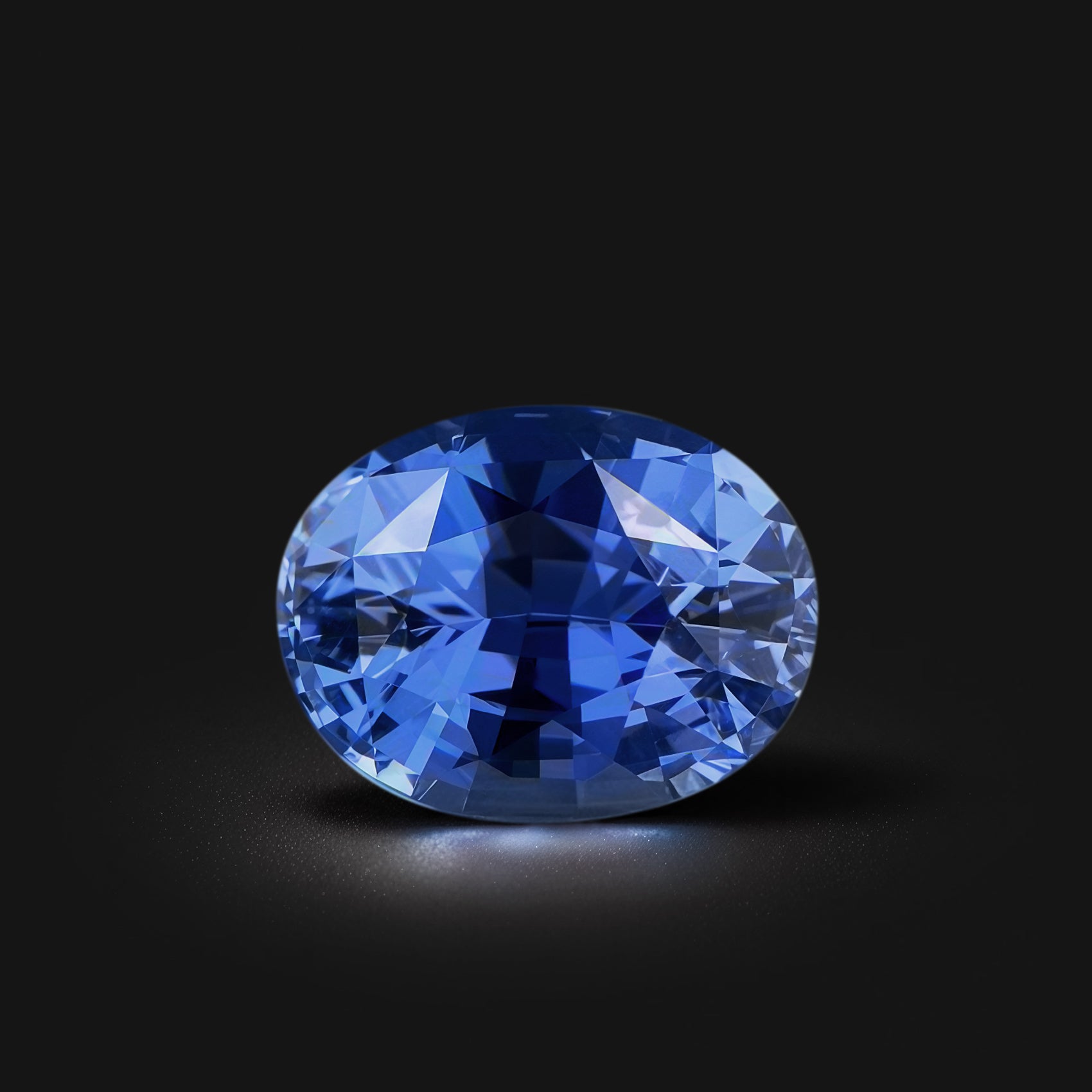 Saphir bleu ovale facetté 2,15ct, bleu soutenu, légèrement inclus, Sri Lanka