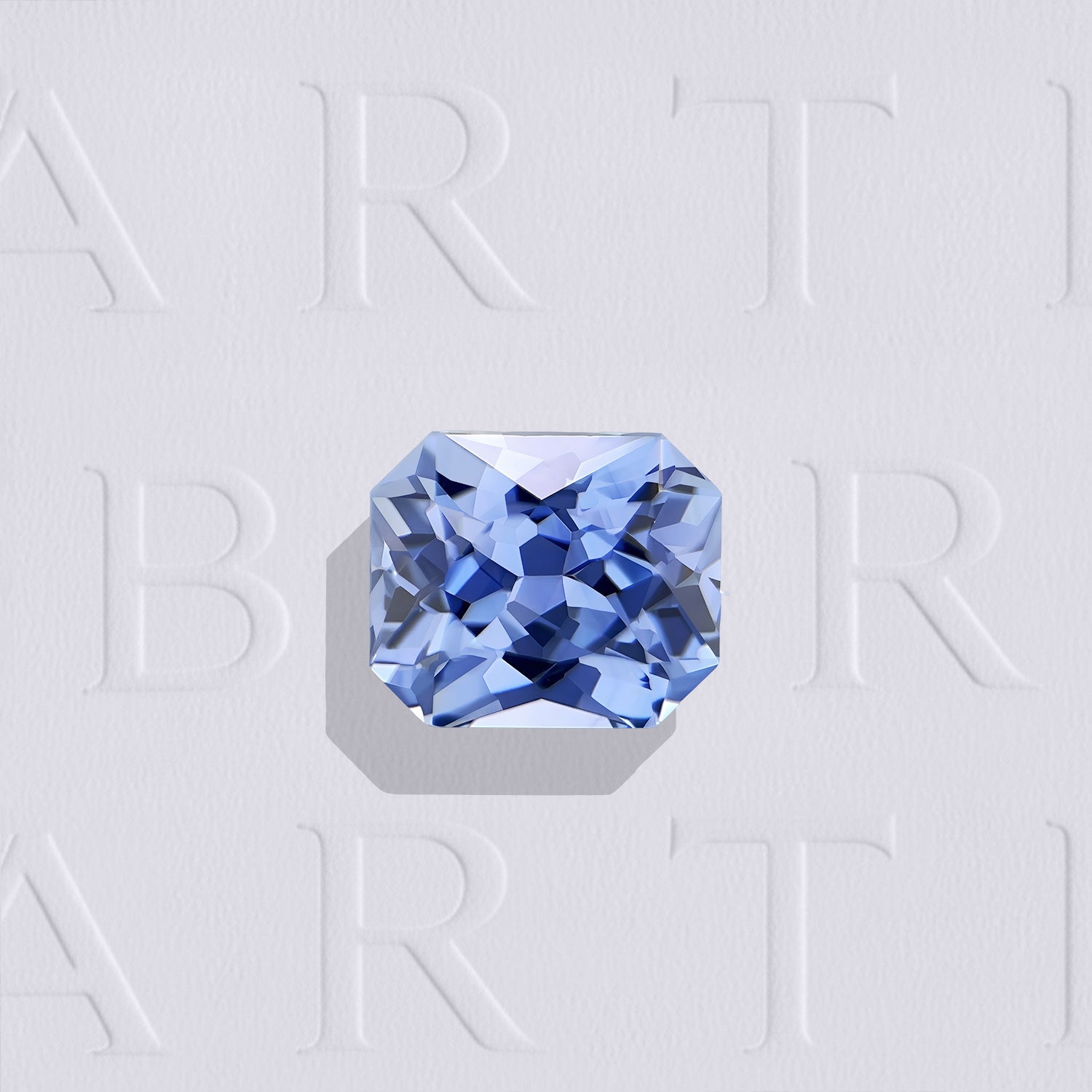 Saphir bleu naturel rectangle à pans coupés facetté de 1.24 carat, originaire du Sri Lanka, de couleur bleu prononcé, sans inclusion visible à l'œil nu et chauffé.