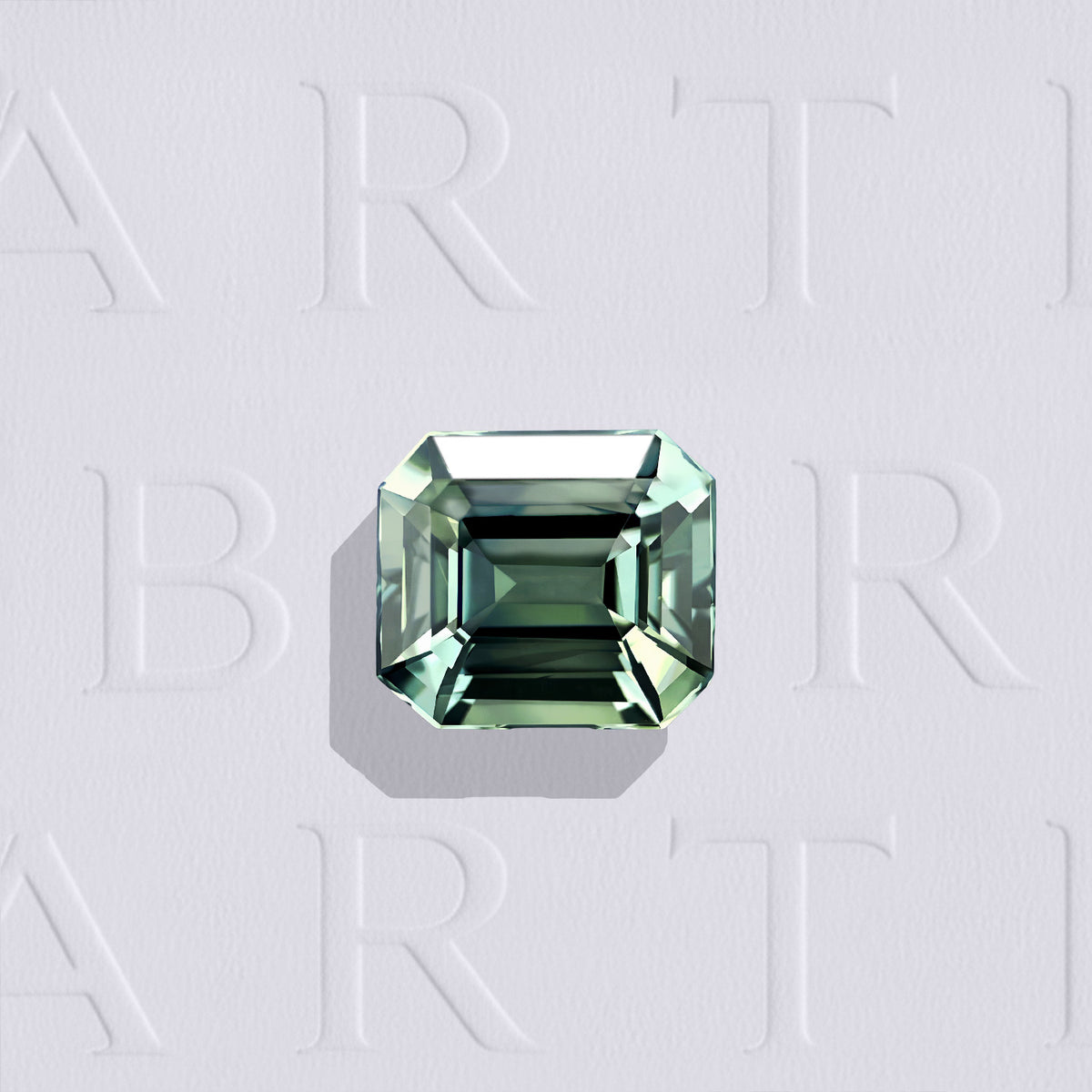 Saphir teal naturel rectangle à pans coupés facetté de 1.19 carat, originaire de Tanzanie, de couleur bleu-vert prononcé et sans inclusion à la loupe 10x.