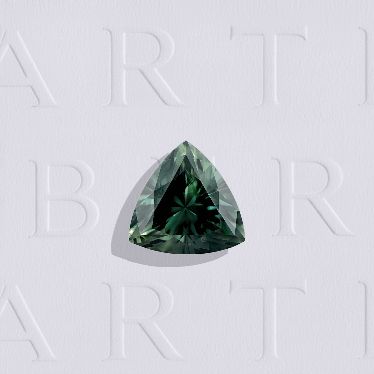 Saphir vert naturel trillion facetté de 1.12 carat, originaire d'Australie, de couleur vert-bleuté soutenu, légèrement inclus, non traité et certifié.