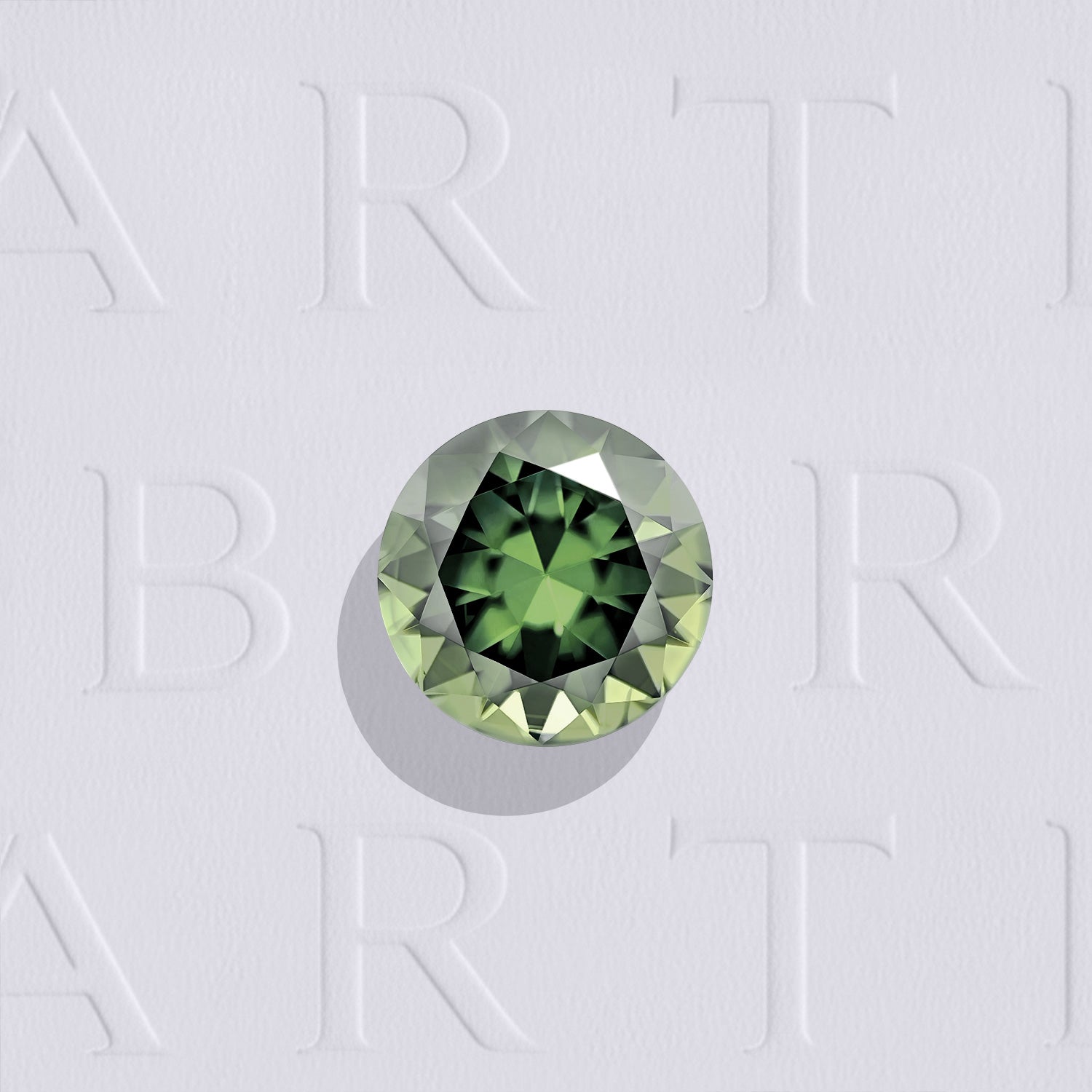 Saphir vert naturel rond facetté de 1.01 carat, originaire d’Australie, de couleur vert-jaune soutenu, sans inclusion visible à l'œil nu. Aucun traitement.