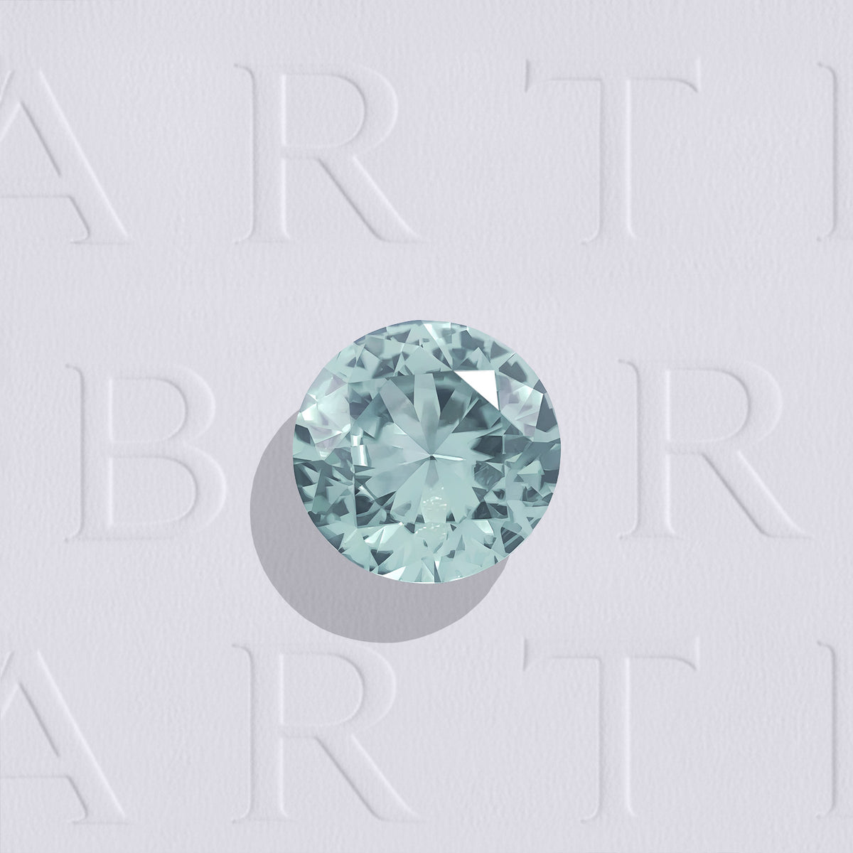 Saphir teal naturel rond facetté de 1.02 carat, originaire du Montana aux États-Unis, de couleur bleu-vert prononcé et légèrement inclus.