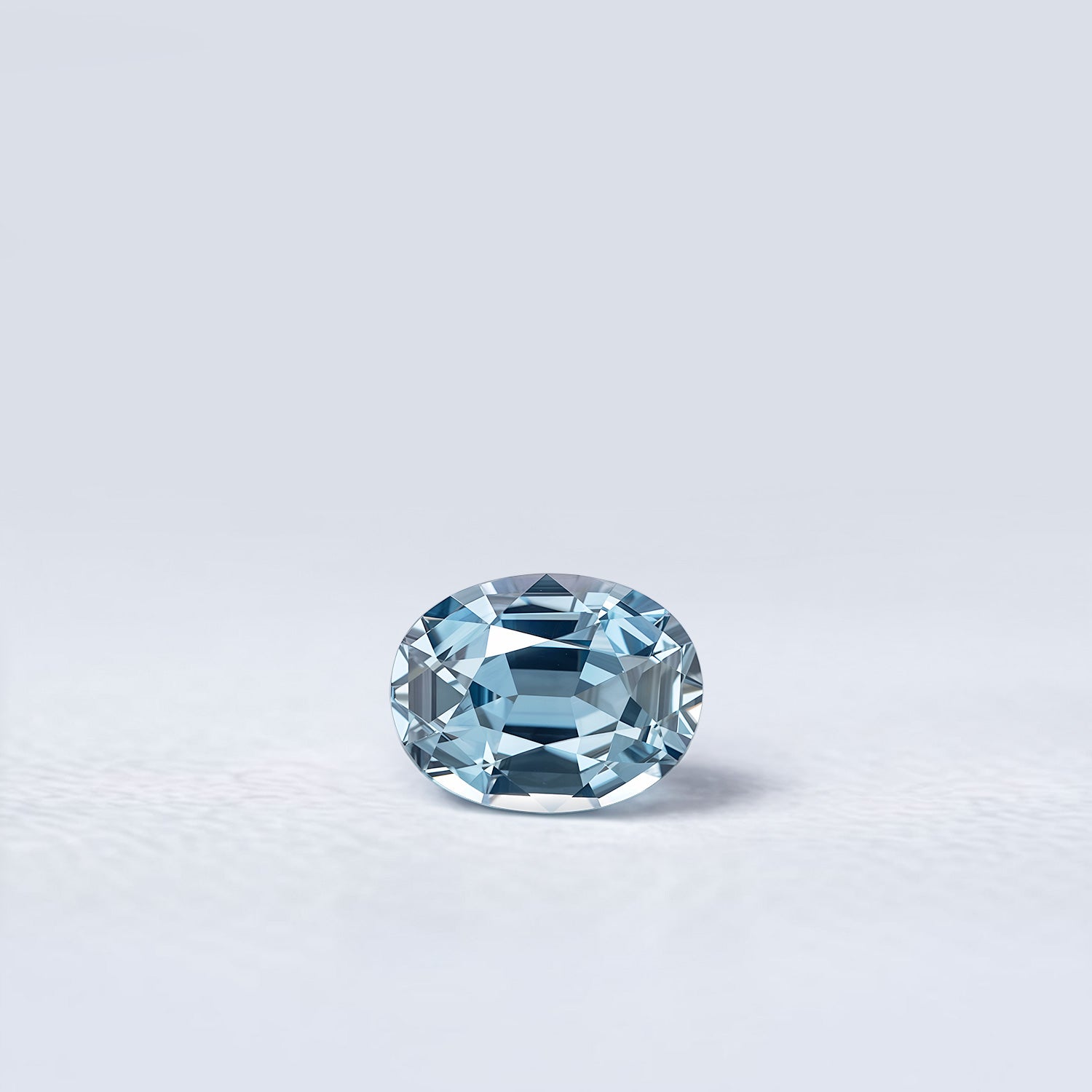 Spinelle bleu-gris naturel ovale de 1.12 carat, facetté, originaire de Tanzanie, sans inclusion visible à l’œil nu