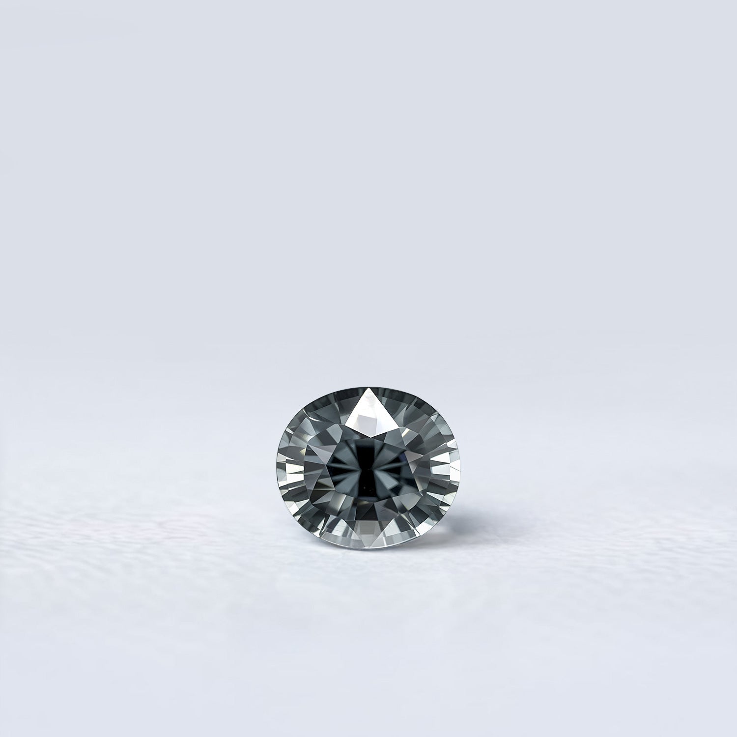 Spinelle gris ovale facetté 1,16ct, couleur gris soutenu, pureté sans inclusion visible, non traité, provenance Birmanie
