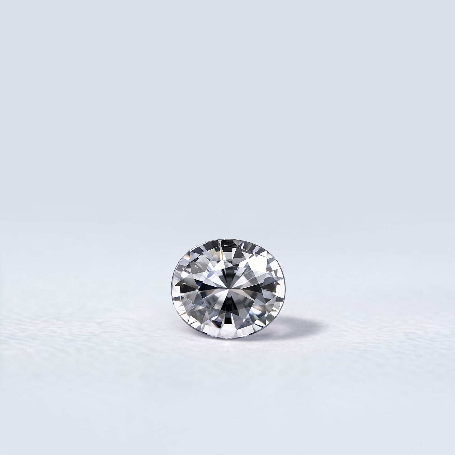 Spinelle gris naturel ovale facetté de 0.90 carat, couleur gris prononcé, originaire de Birmanie