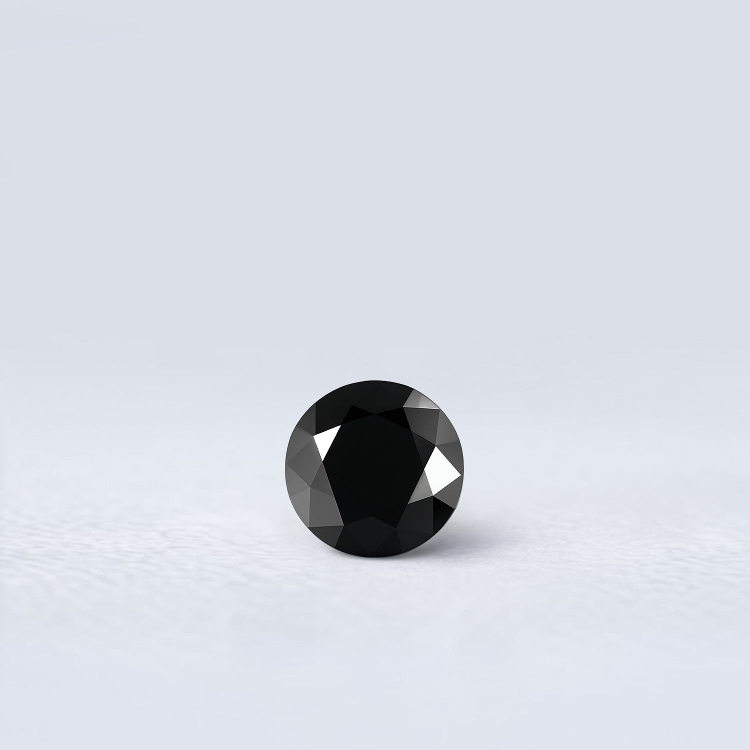 Spinelle noir rond facetté 1,29ct, couleur noire opaque, Thaïlande