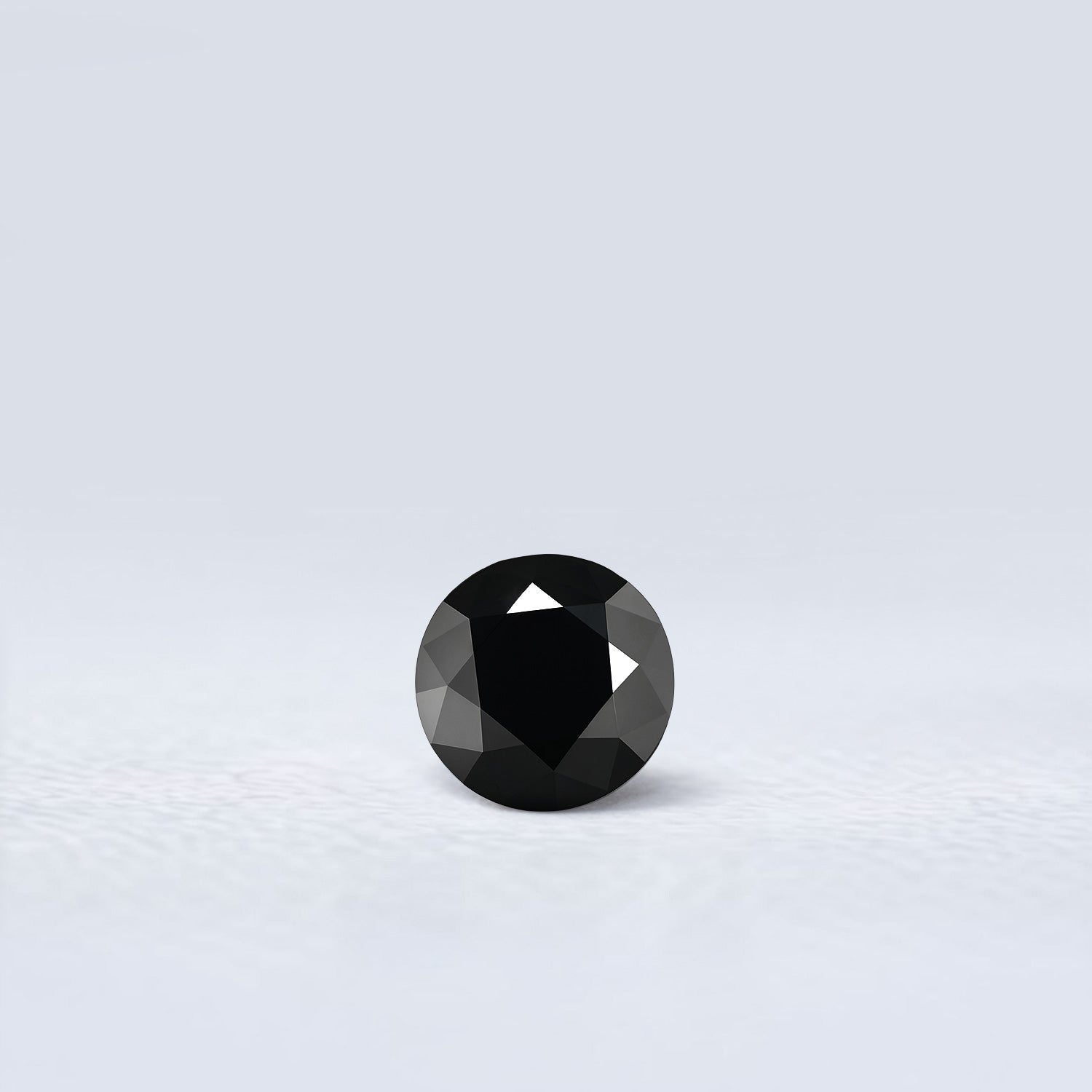 Spinelle noir rond facetté 1,36ct, noir opaque, Thaïlande