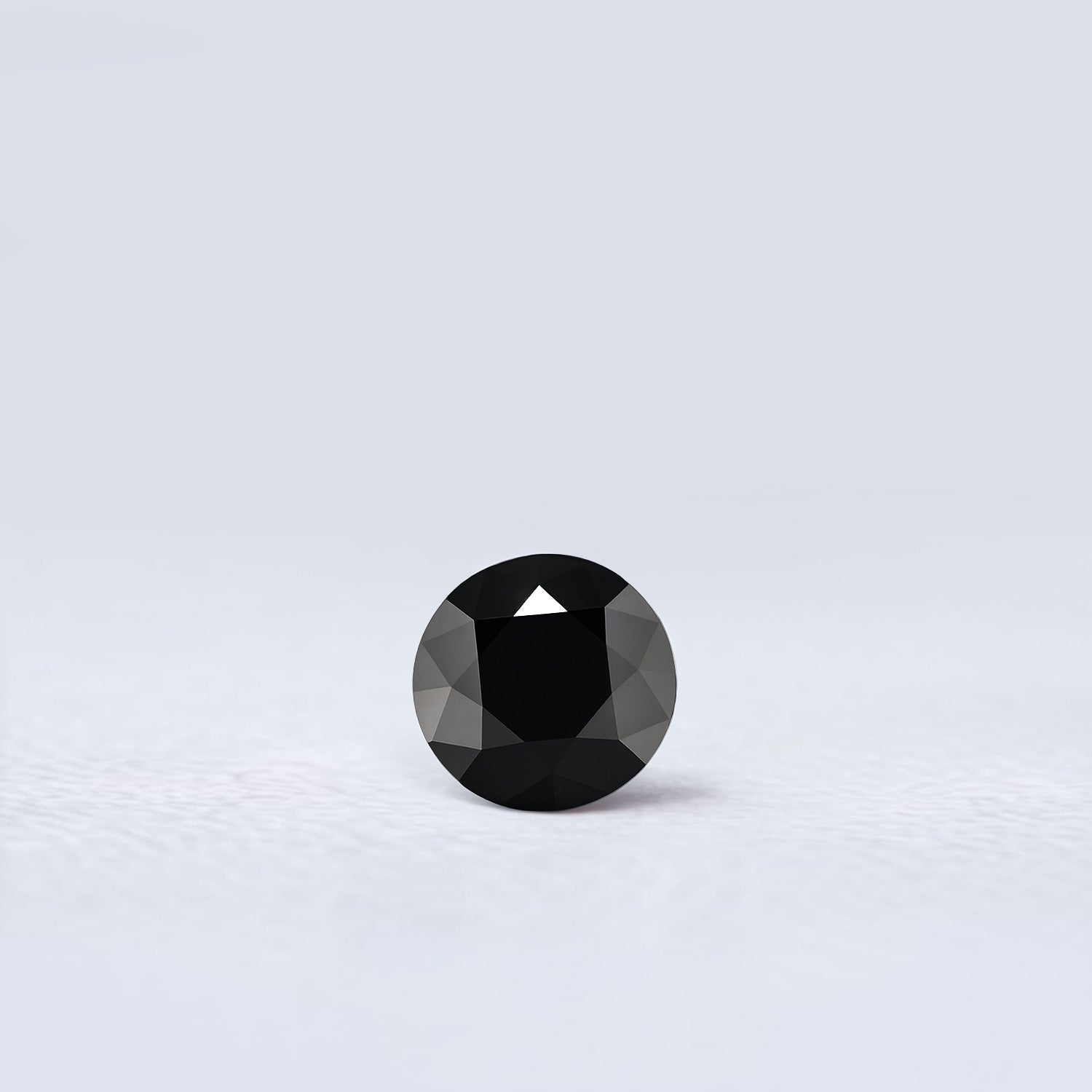 Spinelle noir rond facetté 1,32ct, noir opaque, Thaïlande