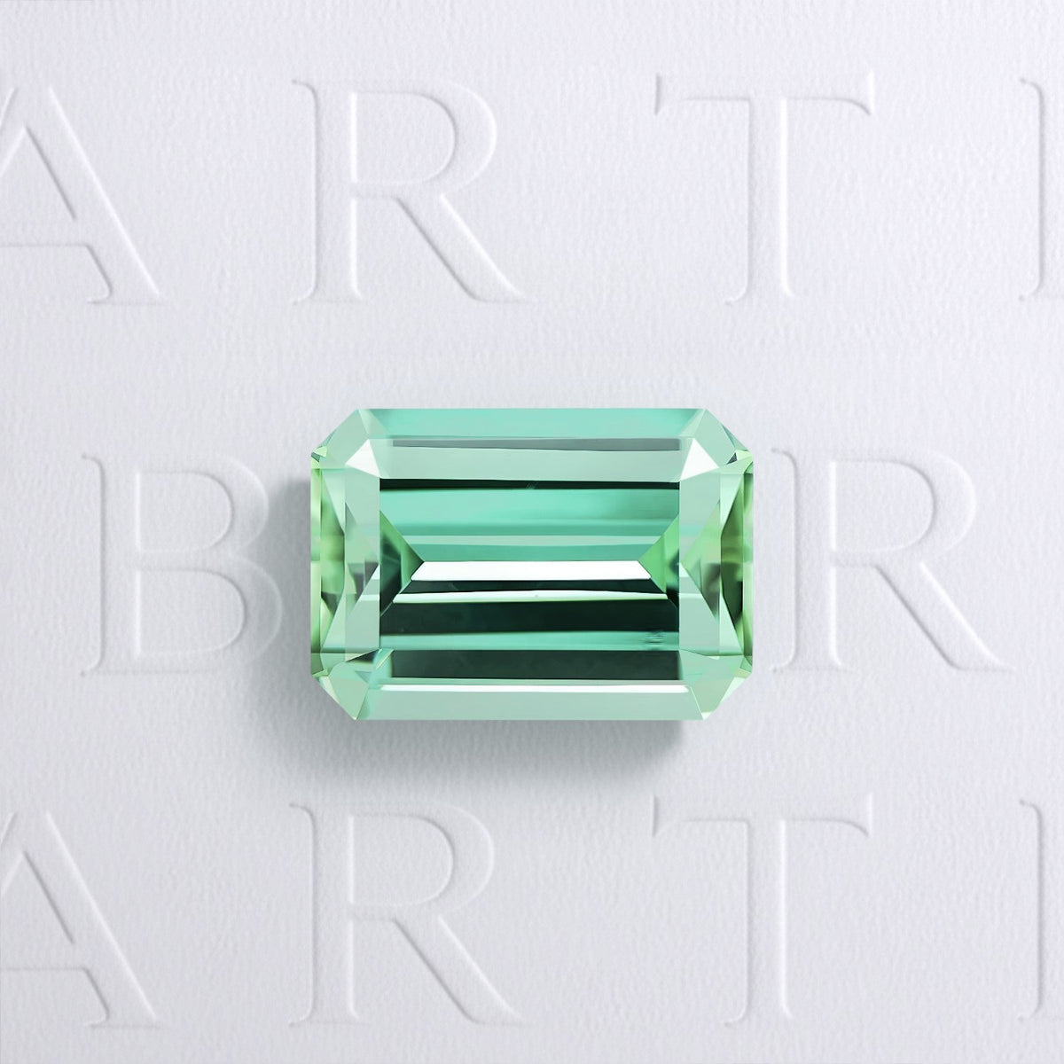 Tourmaline verte naturelle rectangle à pans coupés facettée de 2.16 carats, originaire d’Afghanistan, de couleur vert-bleuté prononcé, sans inclusion visible à l'œil nu. Aucun traitement.