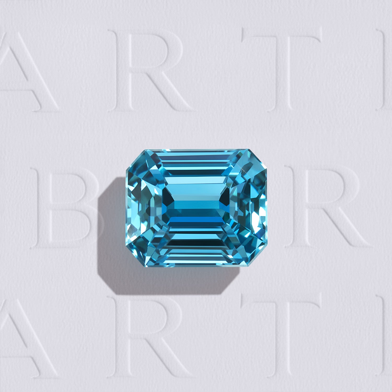 Zircon bleu cyan naturel de 2.37 carats, facetté en rectangle à pans coupés, originaire du Cambodge