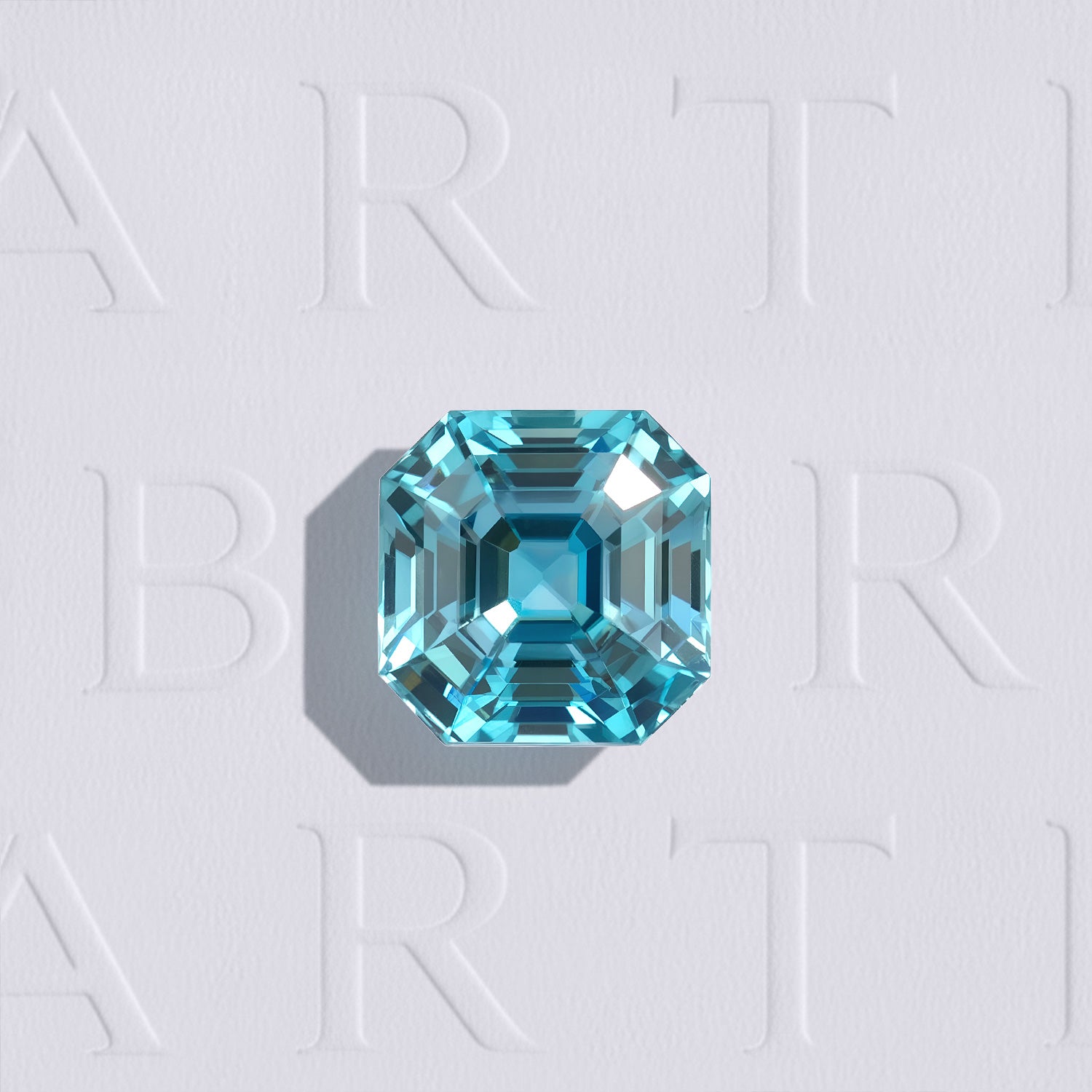 Zircon naturel bleu cyan de 1.29 carat facetté en carré à pans coupés, originaire du Cambodge