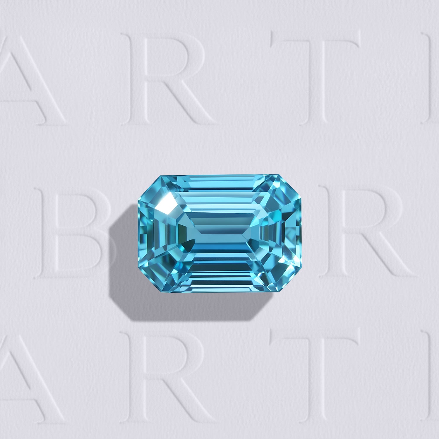 Zircon bleu cyan naturel de 1.60 carat, taillé en rectangle à pans coupés, provanance Cambodge.