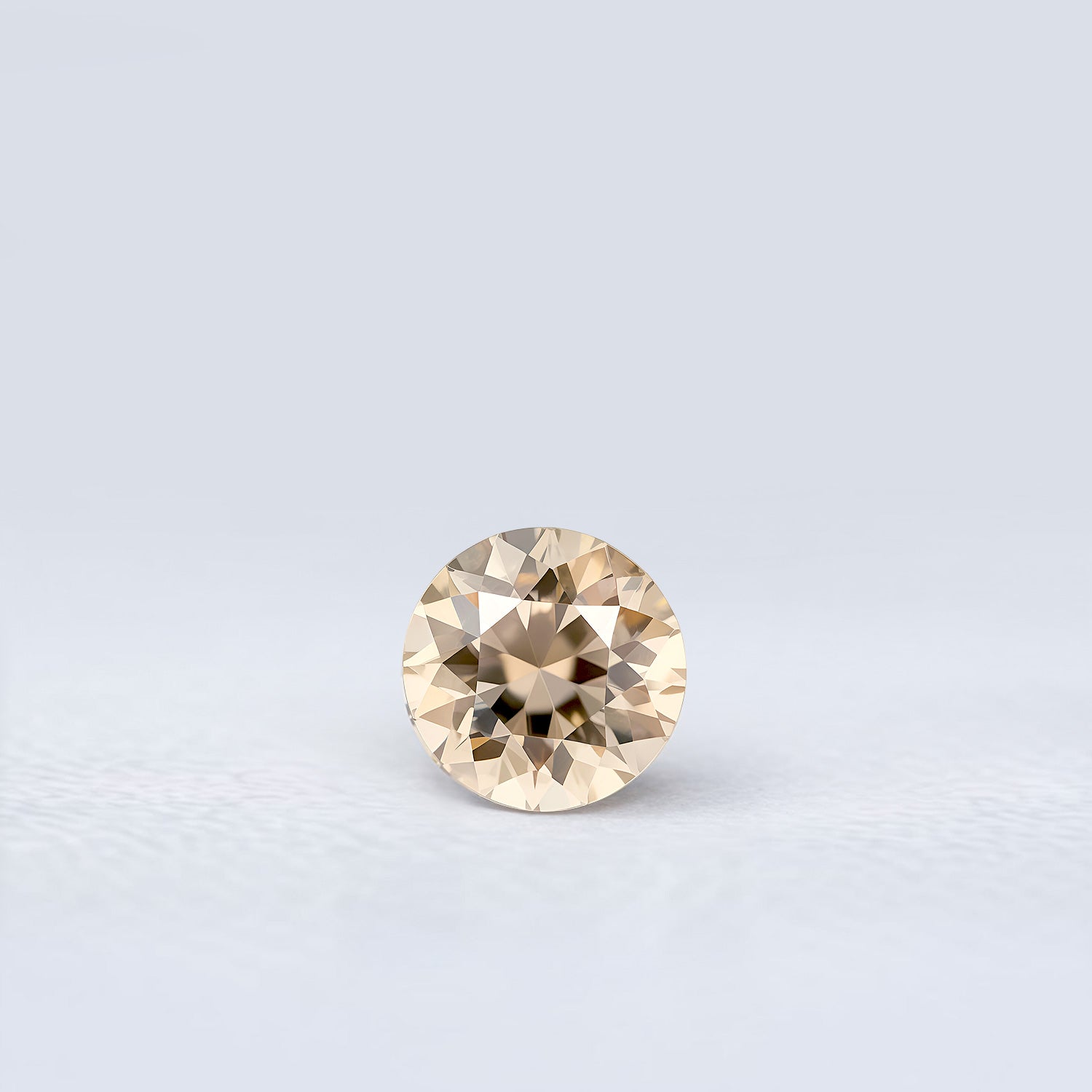 Zircon rond facetté brun léger 1,80 carat, pureté impeccable, Tanzanie
