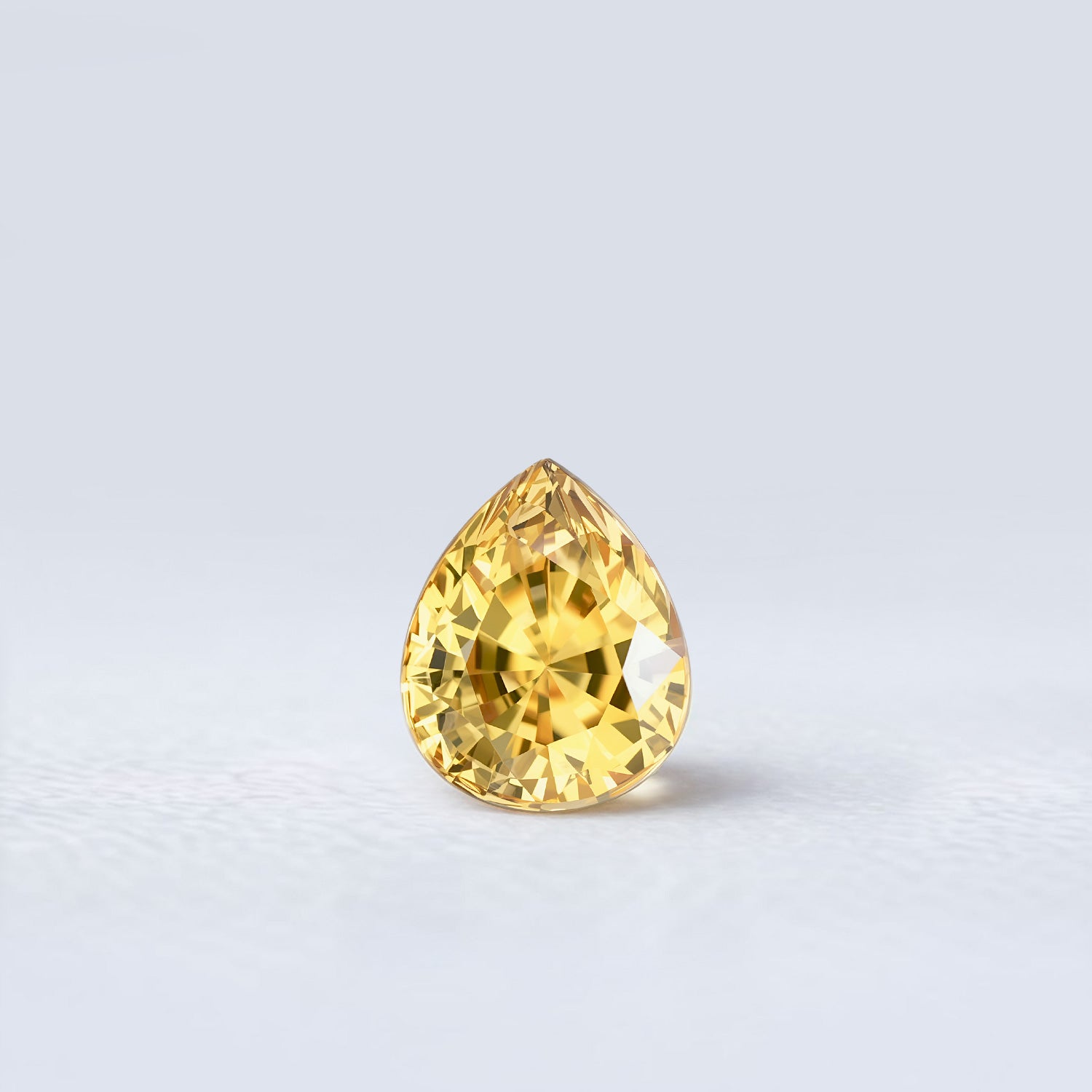 Zircon jaune poire facetté 3,37ct, couleur jaune soutenue, pureté élevée, légère inclusion visible uniquement de dos, provenance Sri Lanka