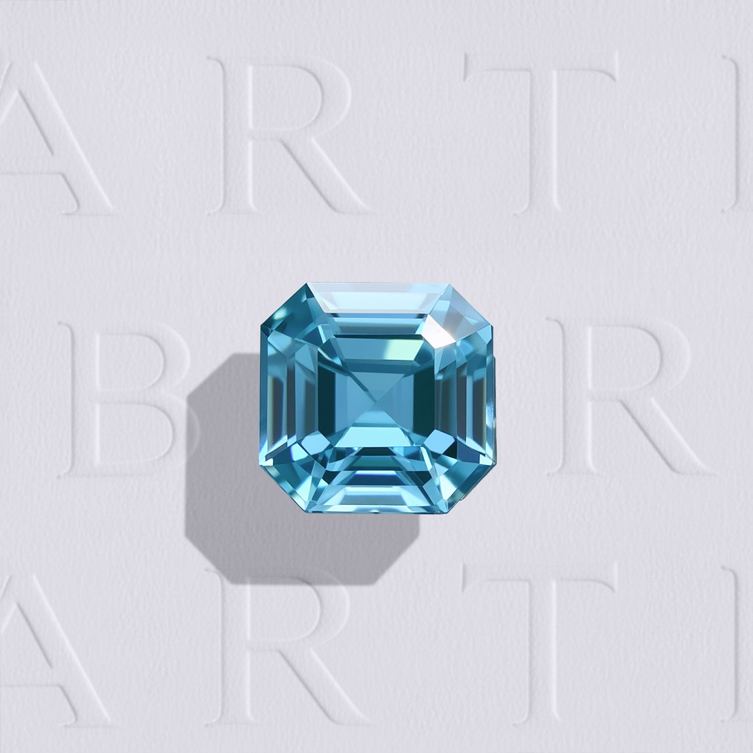 Zircon bleu naturel carré à pans coupés de 1.37 carat facetté, couleur cyan soutenu, chauffe traditionnelle, origine Cambodge