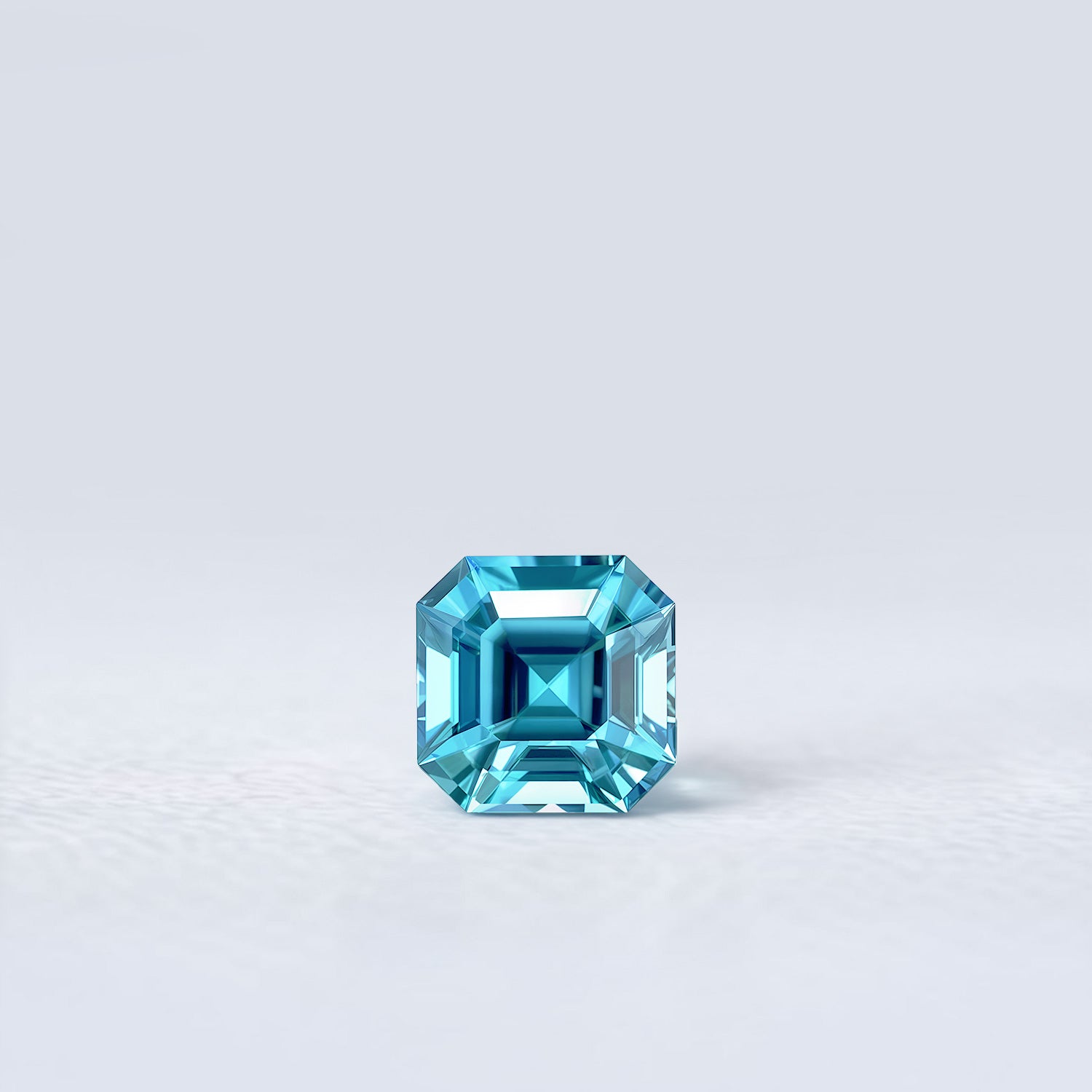 Zircon bleu naturel carré à pans coupés de 1.49 carat facetté, couleur turquoise soutenue, très légèrement inclus, origine Cambodge