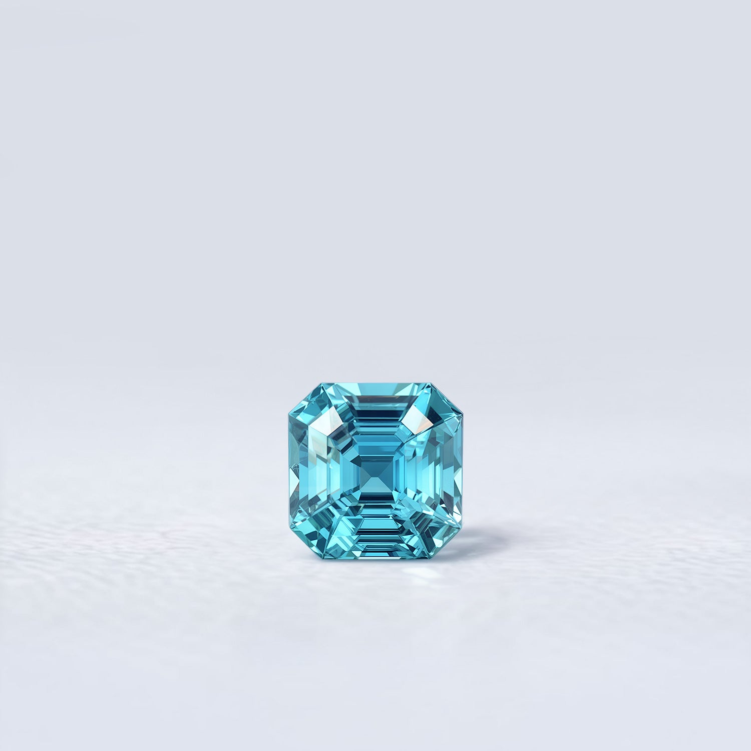 Zircon bleu naturel carré à pans coupés de 1.41 carat facetté, couleur cyan soutenu, origine Cambodge
