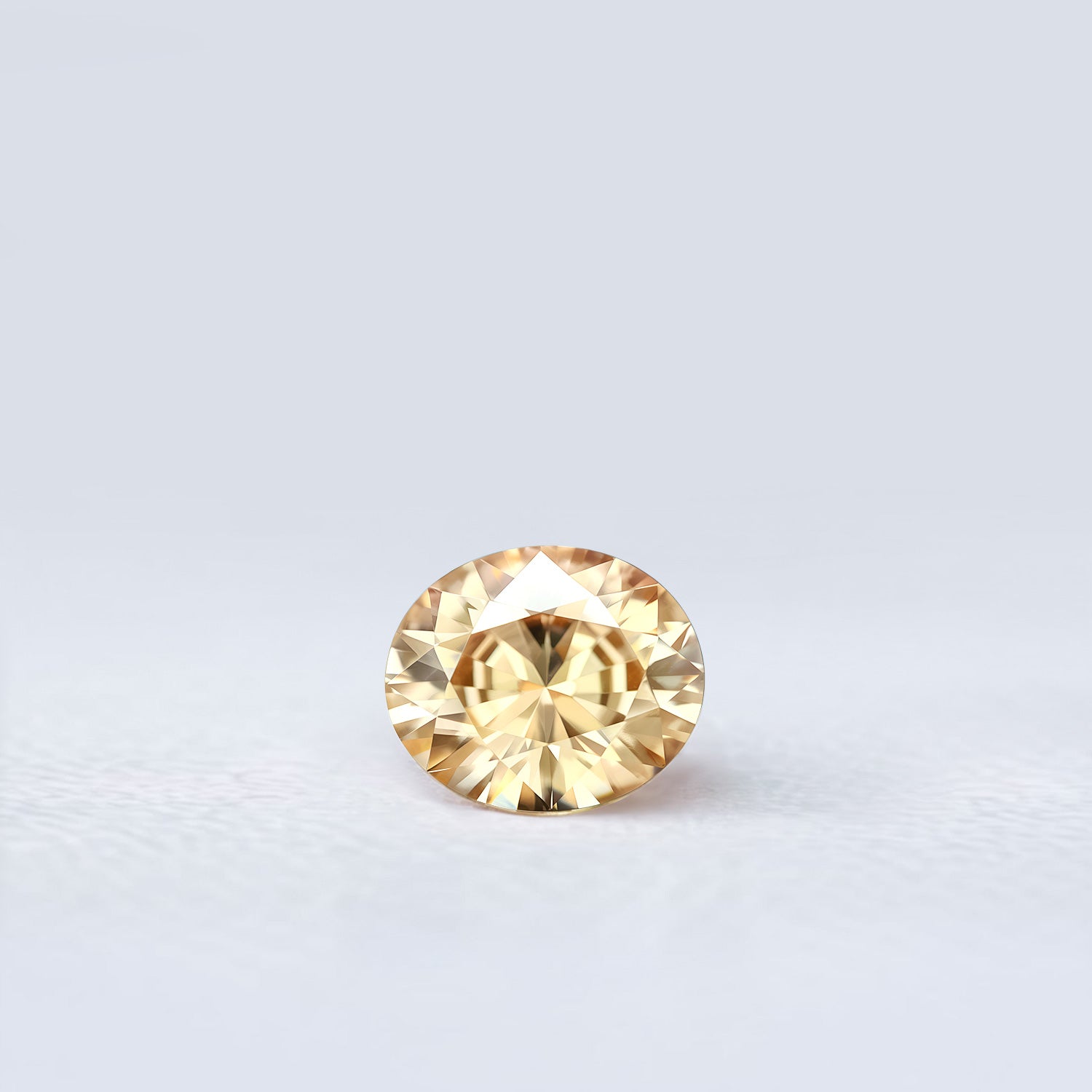 Zircon ovale facetté 2,49ct, teinte jaune orangée légère, pureté sans inclusion à l’œil nu, Sri Lanka