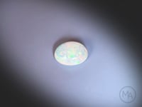 Video Opale naturelle, feux multicolores, cabochon forme ovale, 1.72ct, origine Ethiopie