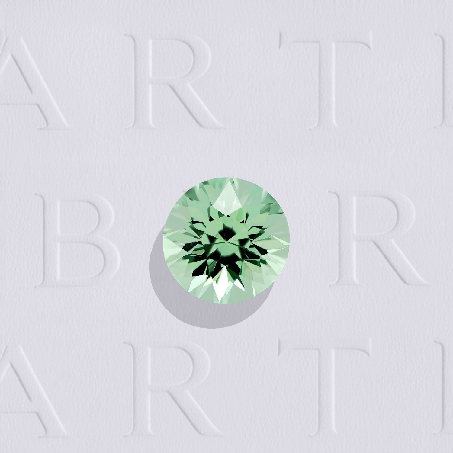 Grenat menthe naturel rond facetté de 0.50 carat, originaire de Merelani en Tanzanie, de couleur vert-jaune prononcée, très légèrement inclus et non traité.