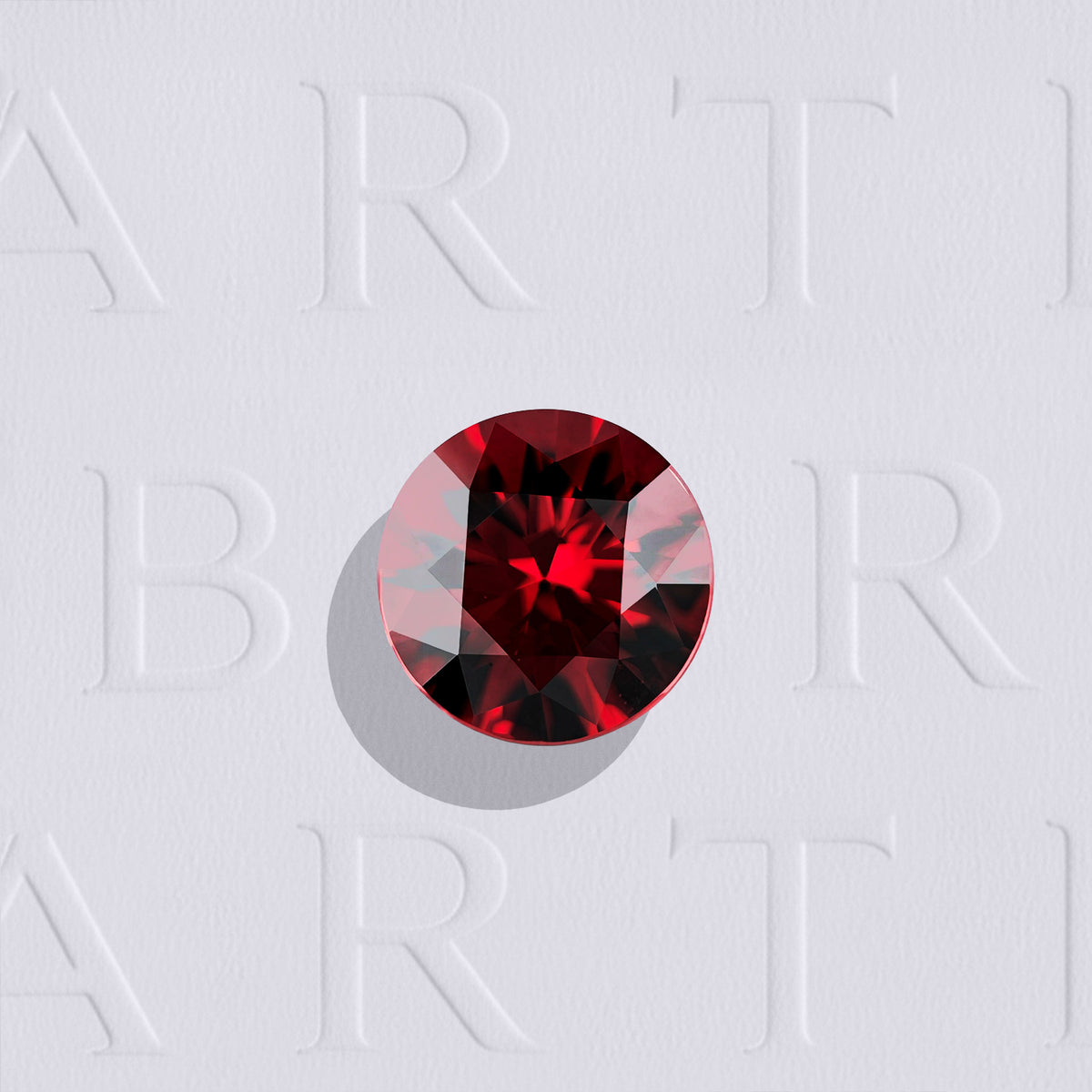 Grenat Rouge naturel rond facetté de 1.56 carat, originaire de Madagascar, présentant une couleur rouge profond et de légères inclusions. Aucun traitement.