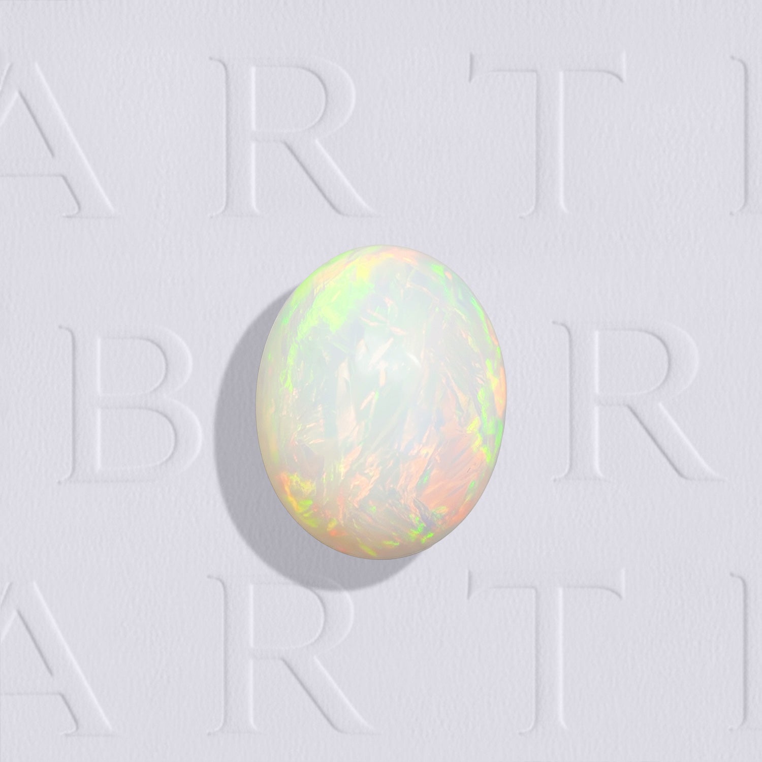 Opale blanche naturelle, taille cabochon, forme ovale, non traitée, feux multicolores, 1.36ct, origine Ethiopie.