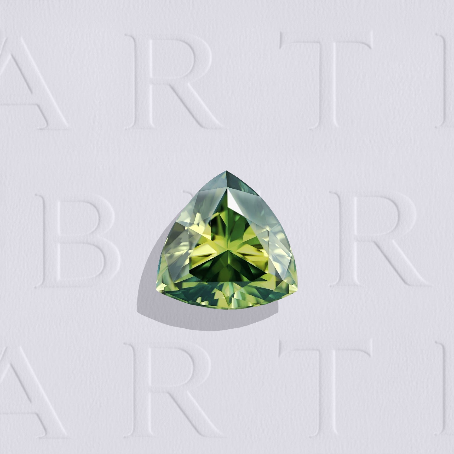 Saphir bicolore naturel trillion facetté de 1.46 carat, originaire d’Australie, présentant une association de jaune et de bleu-vert, sans inclusion visible à l’œil nu et non traité.