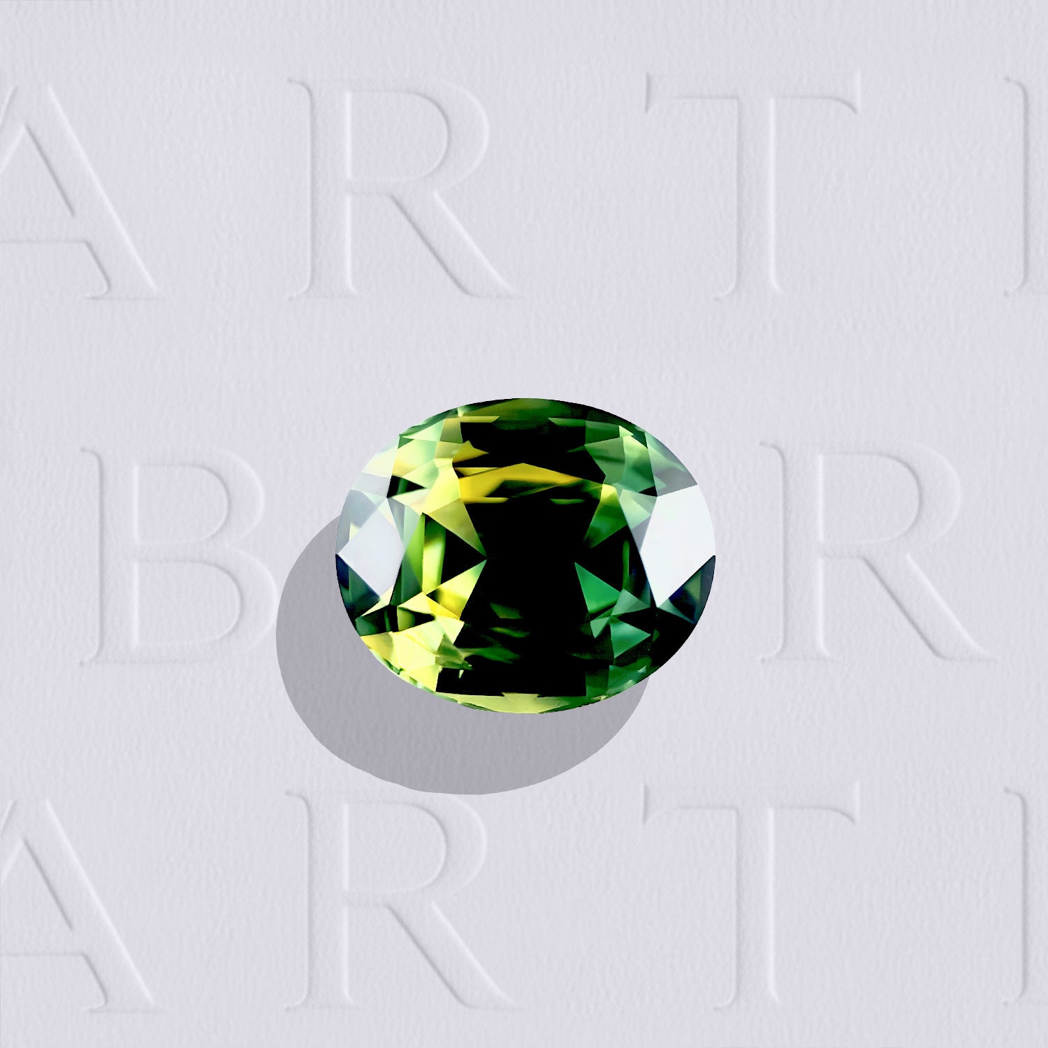 Saphir bicolore naturel ovale facetté de 2.62 carats, originaire d'Australie, aux couleurs vert bleuté et jaune, légèrement inclus et certifié non traité.