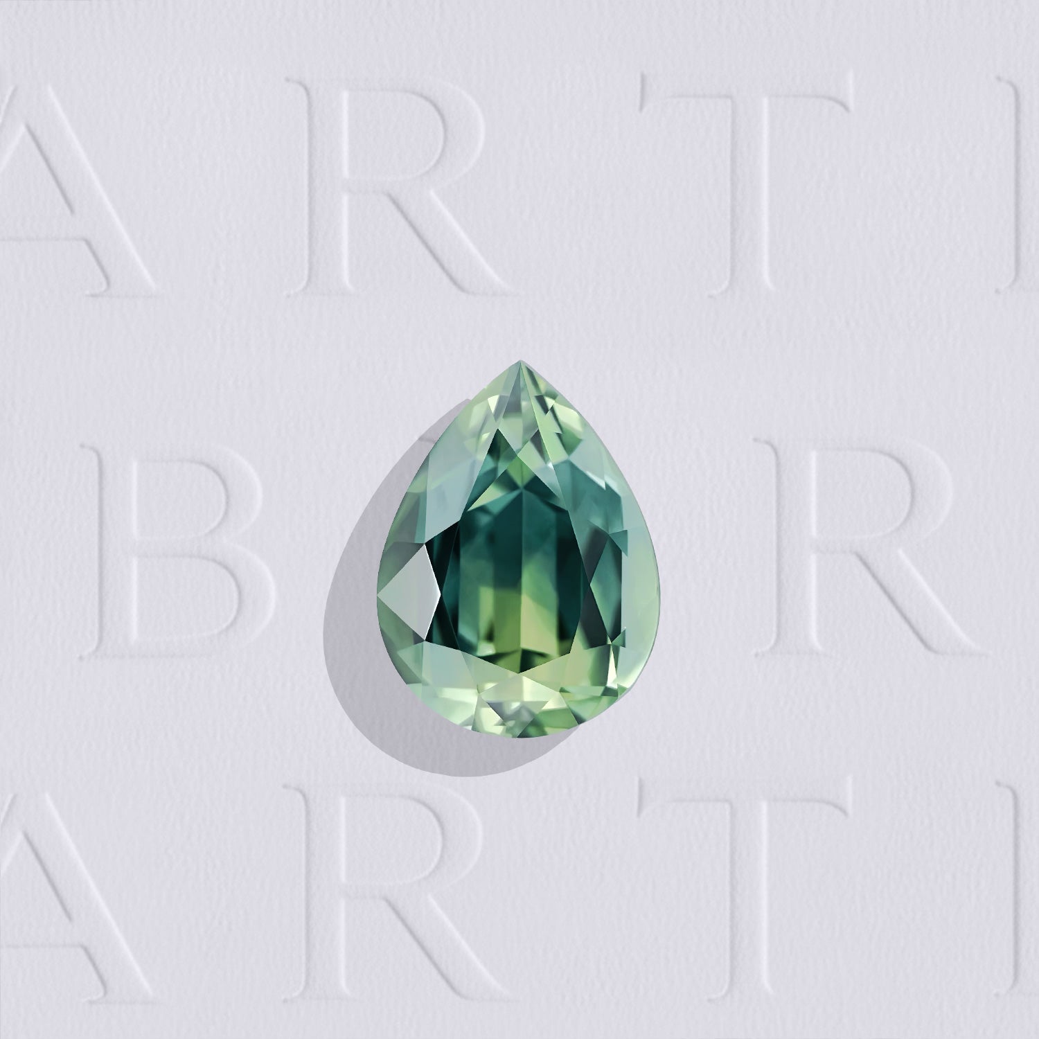 Saphir bicolore naturel poire facetté de 0.88 carat, originaire d’Australie, présentant des couleurs jaune et bleu-vert, sans inclusion visible à l’œil nu et non traité.