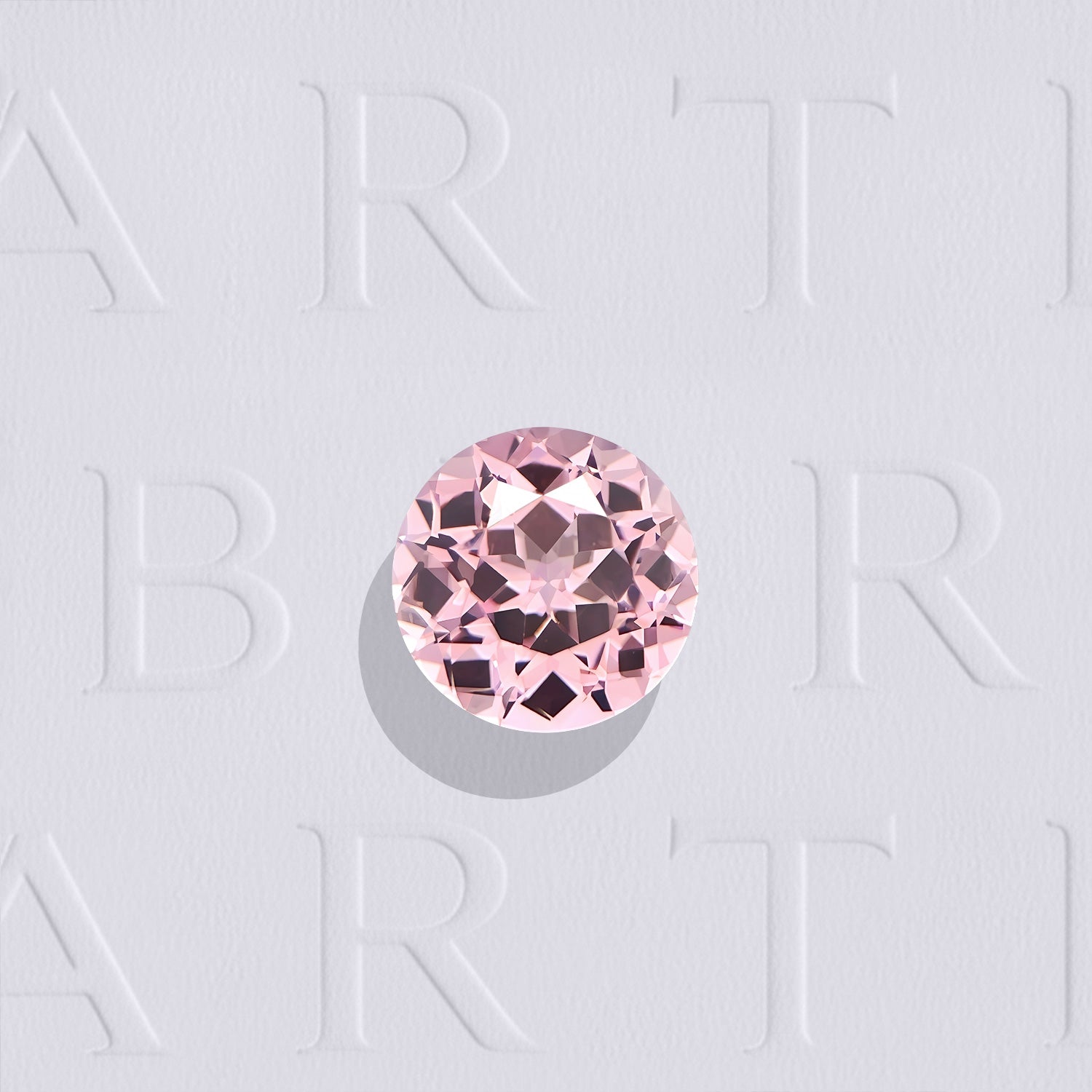 Saphir rose naturel rond facetté de 0.57 carat, originaire du Sri Lanka, de couleur rose prononcé, très légèrement inclus et non traité.