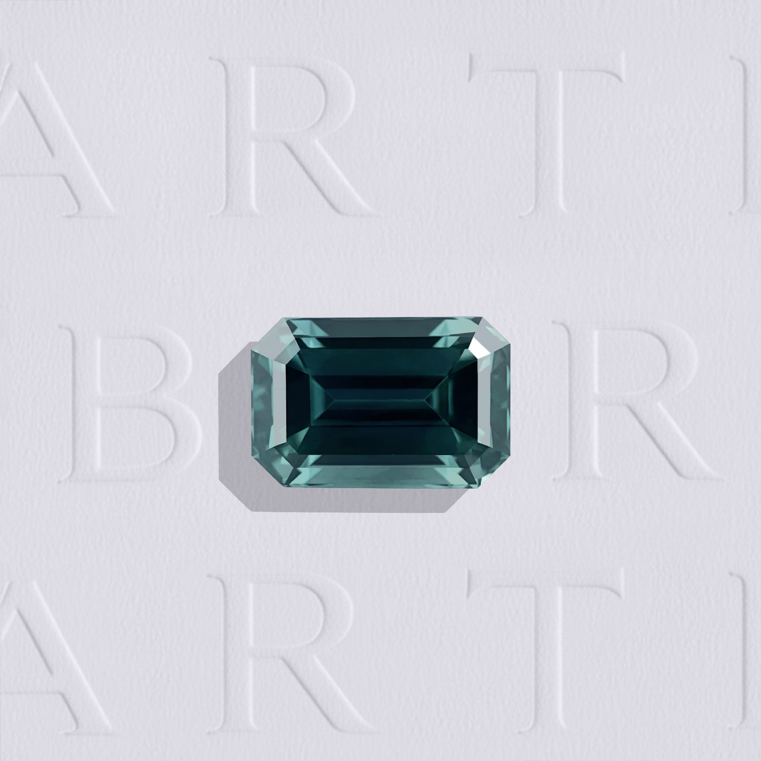 Saphir Teal naturel rectangle à pans coupés facetté de 0.81 carat, originaire d’Australie, de couleur cyan-vert profond, sans inclusion visible à l'œil nu. Aucun traitement.