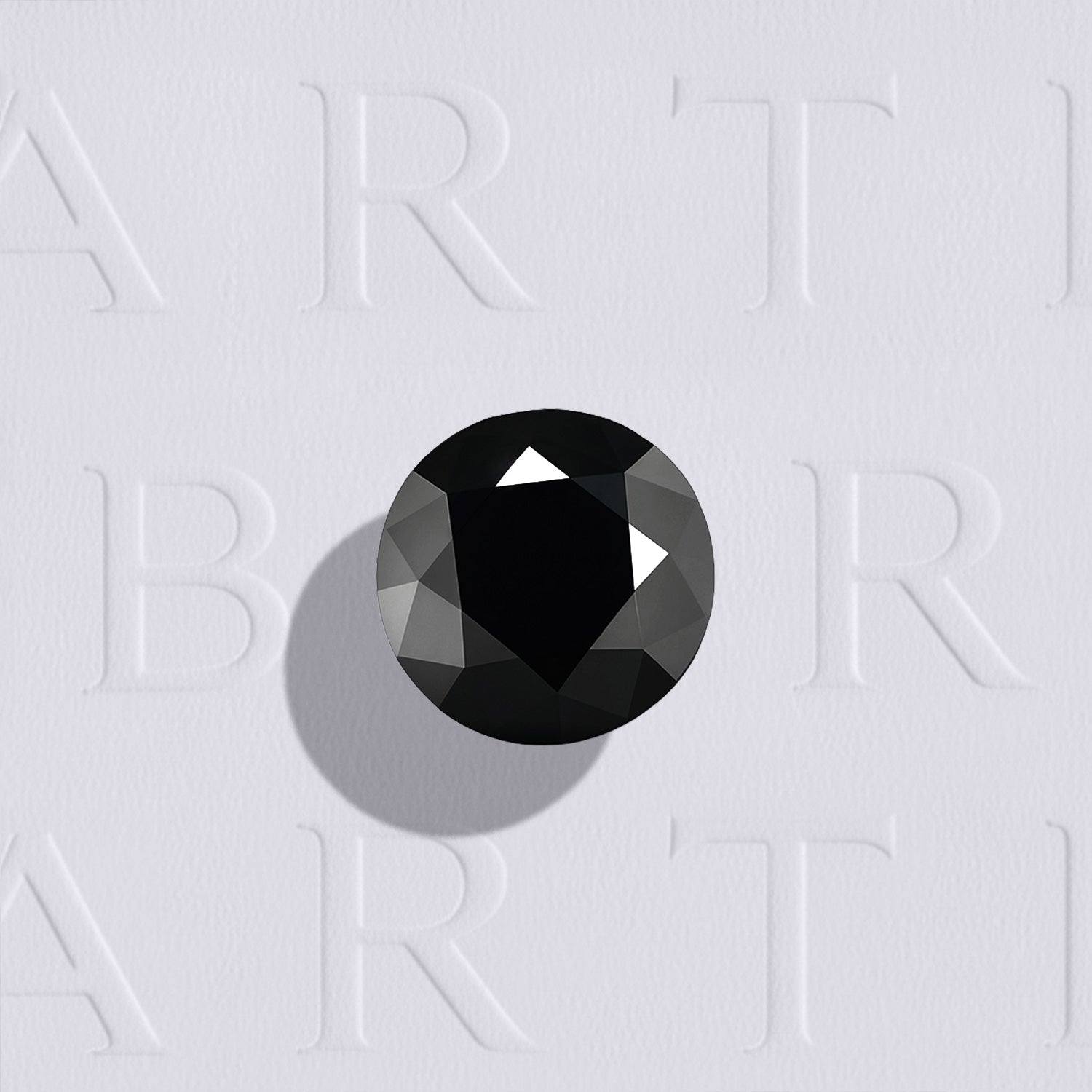 Spinelle noir rond facetté 1,36ct, noir opaque, origine Thaïlande