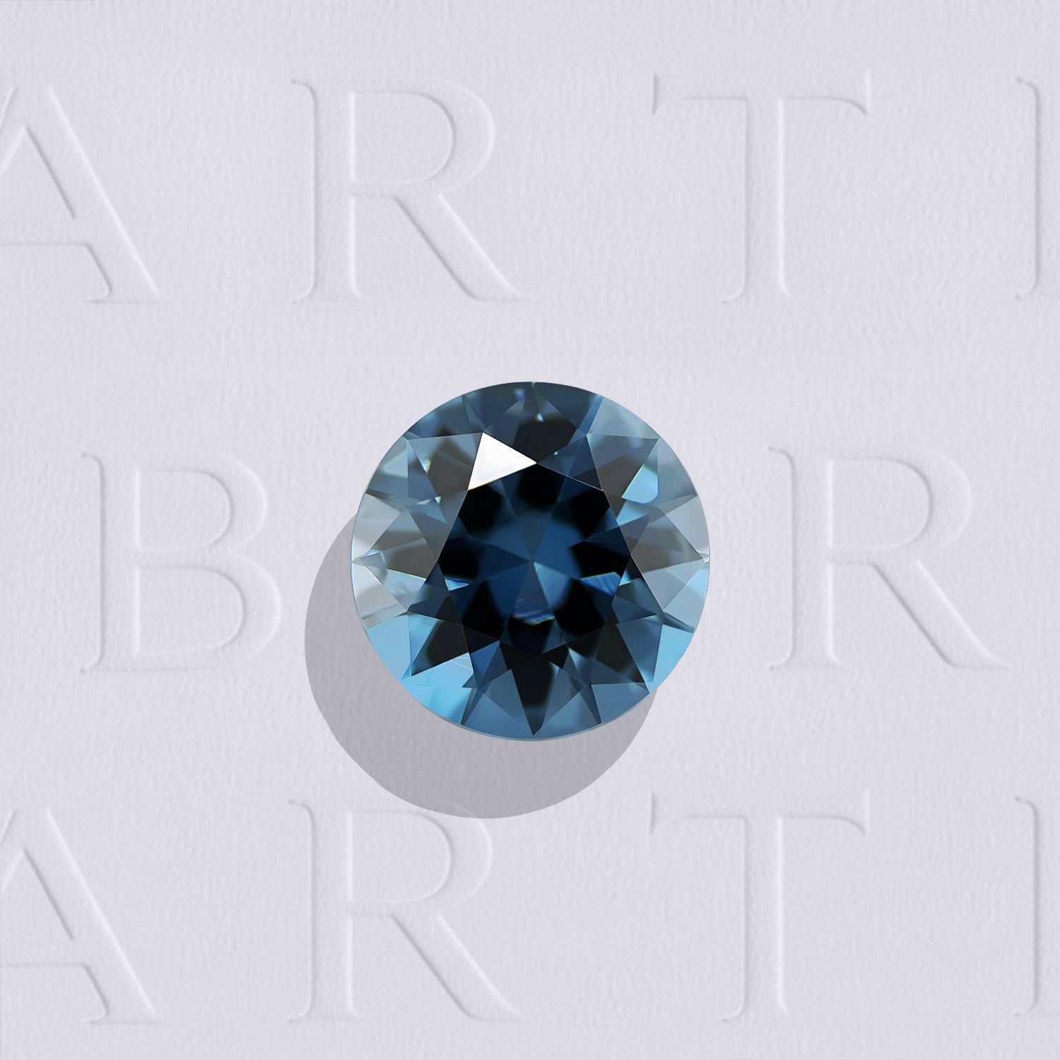 Topaze bleue ronde facettée de 2.50 carats, originaire du Brésil, de couleur cyan-bleuté soutenu London Blue, sans inclusion visible à l'œil nu. Gemme traitée.