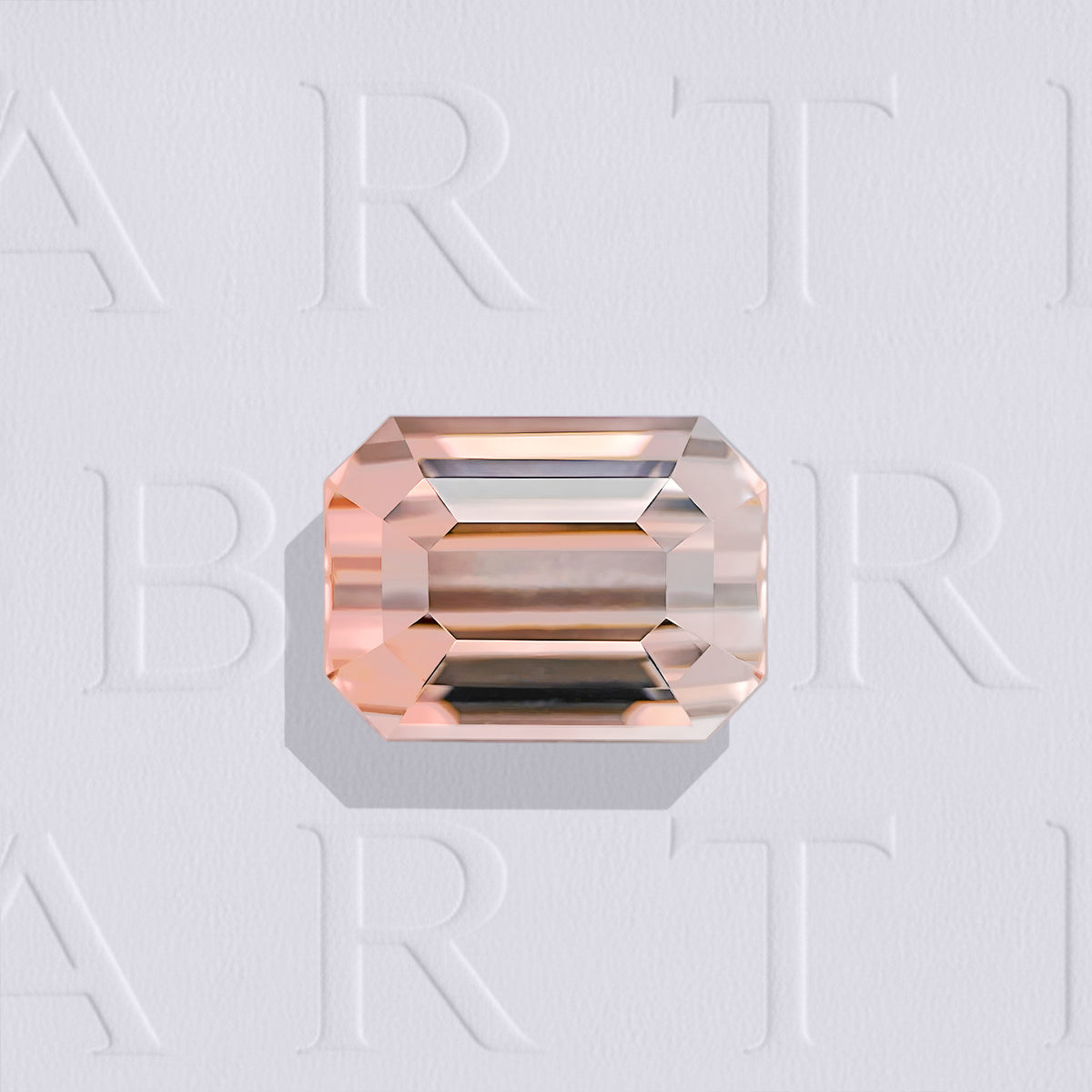 Tourmaline bicolore naturelle rectangle à pans coupés facettée de 2.05 carats, originaire de RD Congo, de couleur orange rosé à orange brun, sans inclusion visible à l’œil nu. Aucun traitement.
